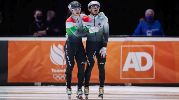 Hungarian brothers Shaoang Liu (on the left) and Shaolin Sándor Liu celebrate in the 1000m final at the 2021 World Short Track Speed Skating Championships
