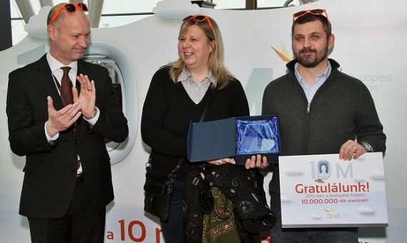 Budapest Airport CEO Jost Lammers (on the left) with the 10 millionth passenger
