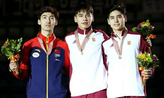 Hungarians on the medal podium: Sándor Liu Shaolin (in the middle) and his brother
